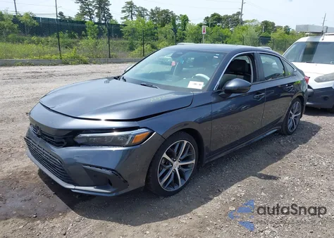 2023 Honda Civic Touring z USA, uszkodzony, nr VIN 2HGFE1F99PH321050